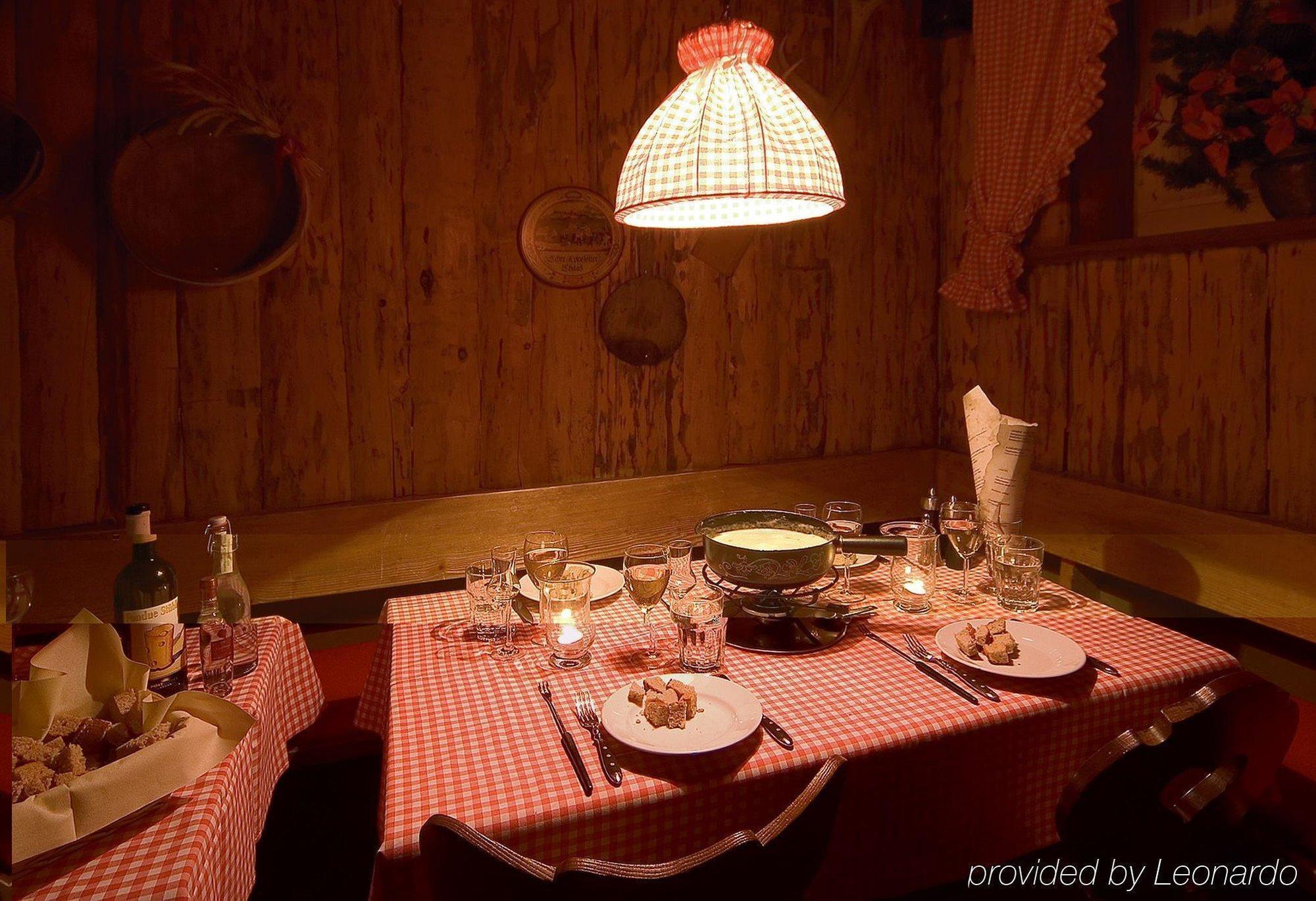 Posthotel Holiday Villa Arosa Restaurant bilde